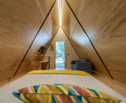 Posteľ alebo postele v izbe v ubytovaní Glamping -Bungalows El Faro
