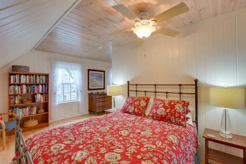 a bedroom with a bed and a ceiling fan at Beachfront Brooklin Studio with Private Balcony! in Brooklin