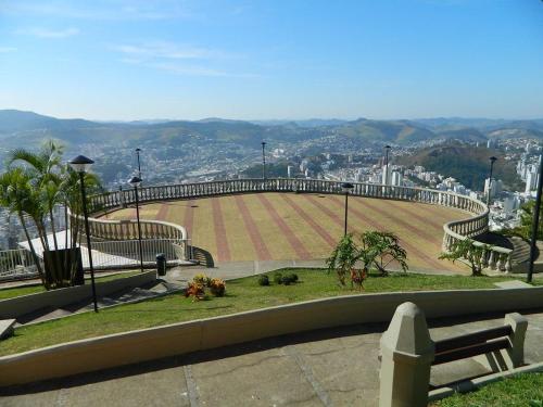 a large amphitheater with a view of a city at hihome - Independência 915 in Juiz de Fora