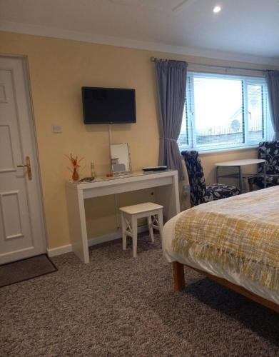 Katil atau katil-katil dalam bilik di Self Contained Garden Annexe in Bodmin