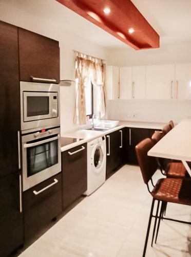 Kuchyň nebo kuchyňský kout v ubytování XL Bugibba Home