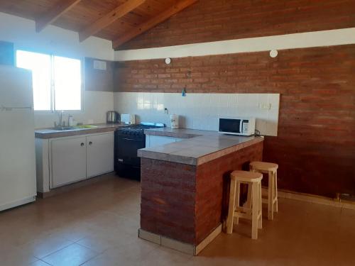 Kuchyň nebo kuchyňský kout v ubytování Quovadis apartamento