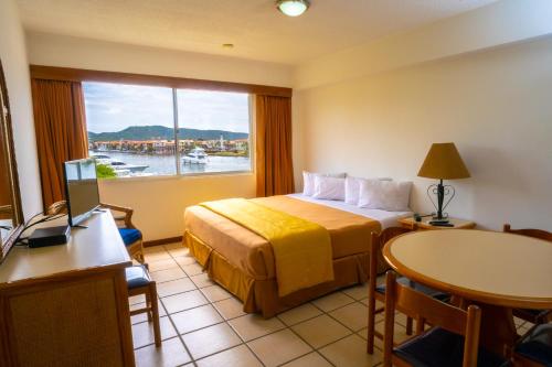 Gallery image of Aqua Vi Marina Hotel & Suites in Puerto La Cruz