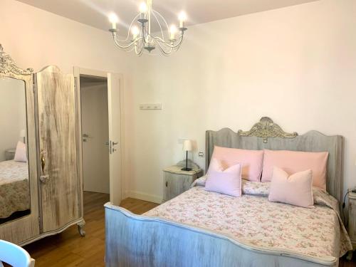 Кровать или кровати в номере Appartamento Simona