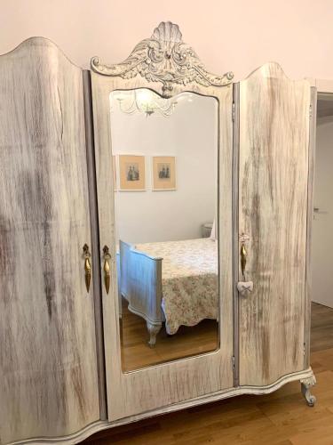 Кровать или кровати в номере Appartamento Simona