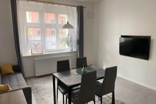 Spacious 2BR apartment 6min from Prague Castle! tesisinde bir televizyon ve/veya eğlence merkezi