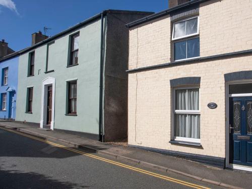 a row of houses on the side of a street at Amelie Cottage in Beaumaris