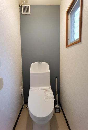 a bathroom with a white toilet in a stall at belle via tokyo - Vacation STAY 60795v in Tokyo
