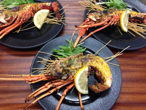 three plates of lobsters on plates with lemon slices at Yugaku Resort Kimukura - Vacation STAY 93873v in Tokunoshima