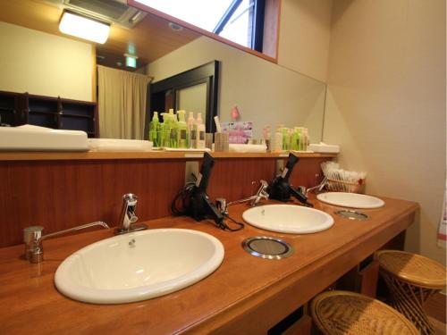 Ένα μπάνιο στο Anan Plaza Hotel - Vacation STAY 54404v