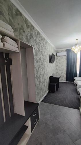 Et tv og/eller underholdning på Отель Сахара