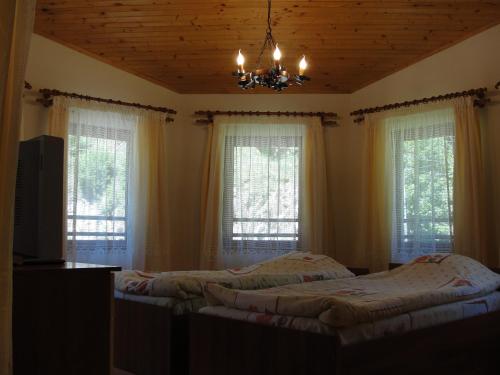 Una cama o camas en una habitación de Villa Persenk