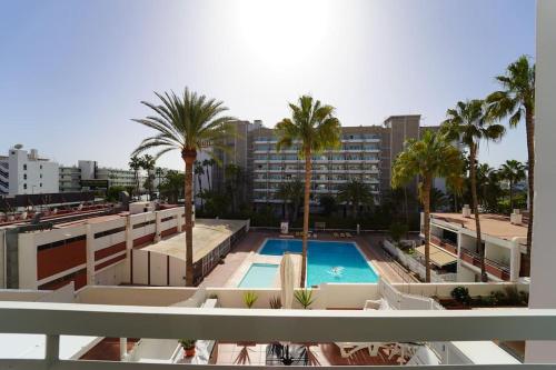 a view of a swimming pool from a building at Tropical Views - Paya del Inglés in Maspalomas