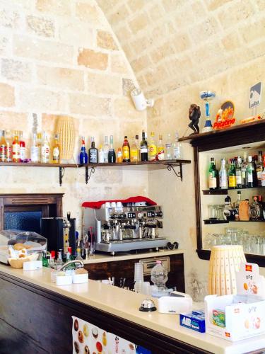 a kitchen with a counter with a counter top with a counter at Castello Conti Filo in Torre Santa Susanna