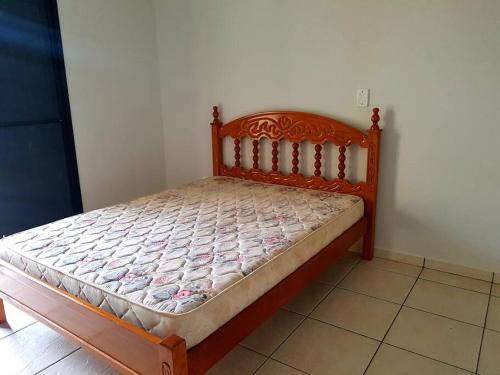 Katil atau katil-katil dalam bilik di Casa para Temporada em Cananéia