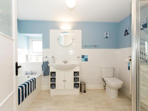 a bathroom with a sink and a toilet at High Street in Kirkcudbright