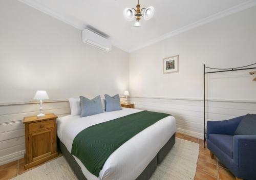 En eller flere senge i et værelse på Scarborough Cottage