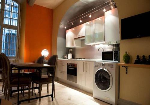 Η κουζίνα ή μικρή κουζίνα στο Appartement La Masse