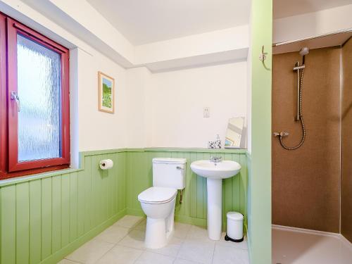 a bathroom with a toilet and a sink at Riof Bay - Uk31251 in Valtos