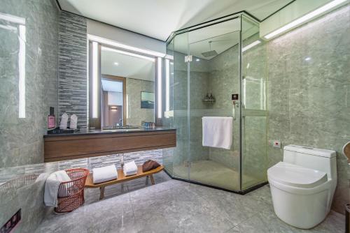 Baðherbergi á Huanyu Jun Hui Hotel