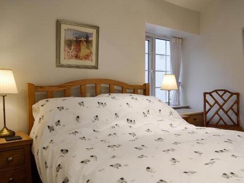Postel nebo postele na pokoji v ubytování Castle Howe