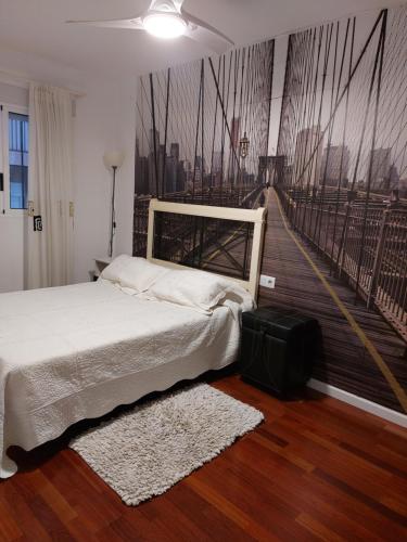 ベテラにあるBonito piso 4 habitaciones en Béteraのベッドルーム1室(ベッド1台付)が備わります。