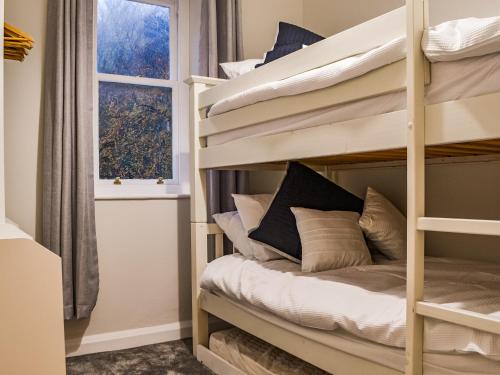 Poschodová posteľ alebo postele v izbe v ubytovaní Hazelrigg