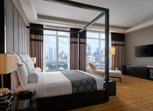 Кровать или кровати в номере The Majestic Hotel Kuala Lumpur, Autograph Collection