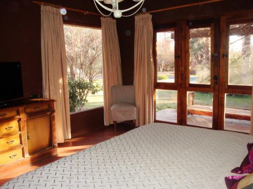 Ένα ή περισσότερα κρεβάτια σε δωμάτιο στο Guesthouse El Tata