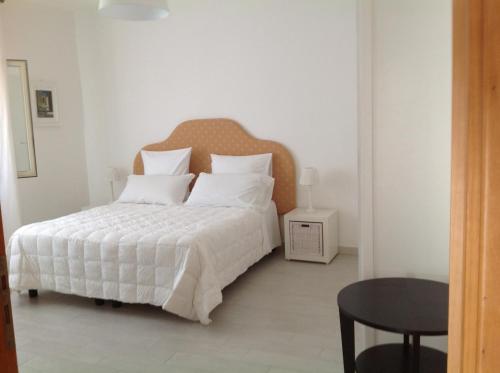 Ένα ή περισσότερα κρεβάτια σε δωμάτιο στο Attico al Centro