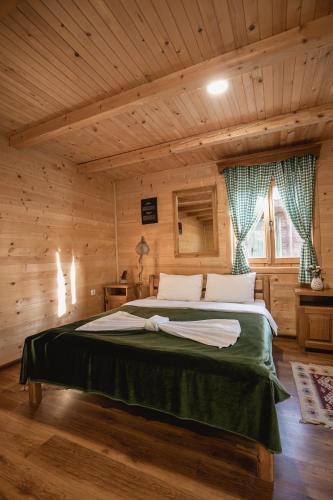 Postel nebo postele na pokoji v ubytování JELA NATURAL RESORT