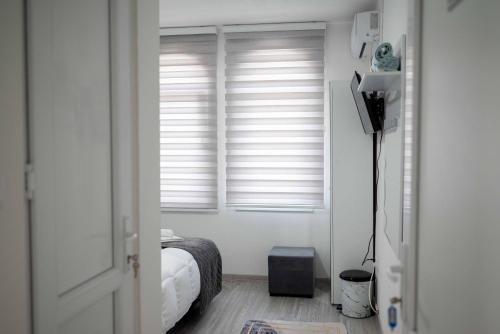 Postel nebo postele na pokoji v ubytování The Sun Apartments Brcko