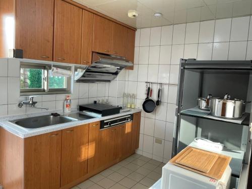 Kuchyň nebo kuchyňský kout v ubytování 埔里北梅民宿BEI MEI Homestay可包棟