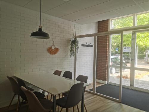 a dining room with a table and chairs at Yerseke Maarten & Hanh in Yerseke