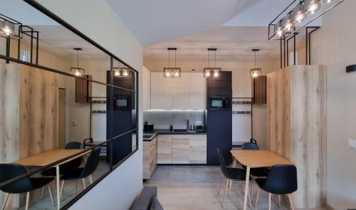 Kuchyň nebo kuchyňský kout v ubytování THE LOFT Szklarska Poręba