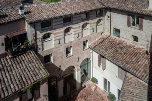 an overhead view of an old brick building with roofs at Hotel Residenza la Ceramica in Fabriano