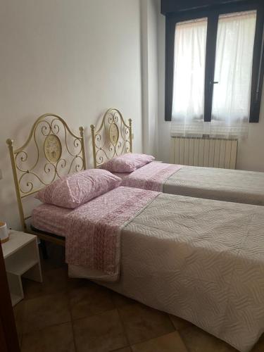 Postel nebo postele na pokoji v ubytování Casa Silvana