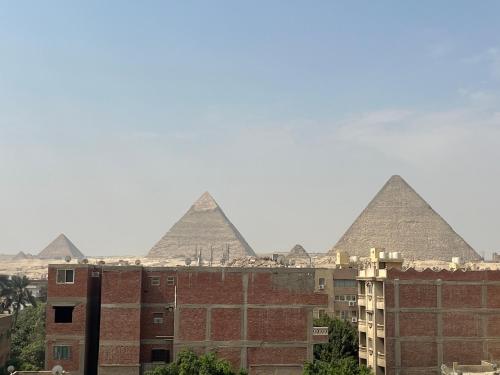 a view of the pyramids from a building at Badr pyramids inn in Cairo