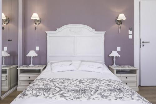 Postel nebo postele na pokoji v ubytování La Villa Les Mots Passants