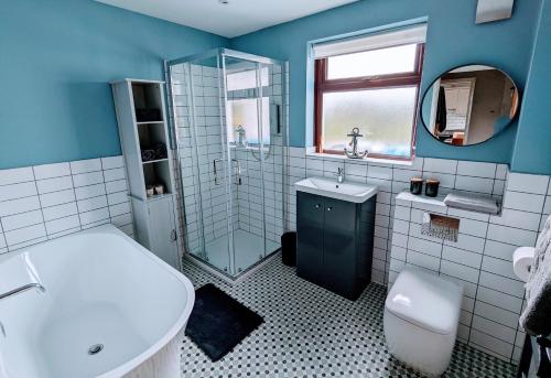 Et badeværelse på Tyrella Cottage