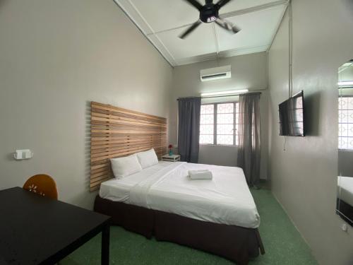 Ένα ή περισσότερα κρεβάτια σε δωμάτιο στο Cheras homestay @kelian