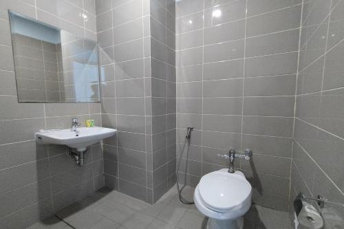 Hotel Sutha Inn Syariahにあるバスルーム