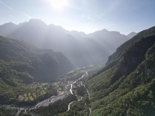 a view of a valley in a mountain range at Guesthouse Freskia in Theth