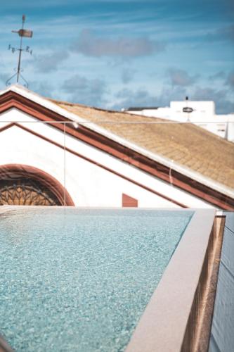 a view of the roof of a building at CISNES PALACE in Sanlúcar de Barrameda