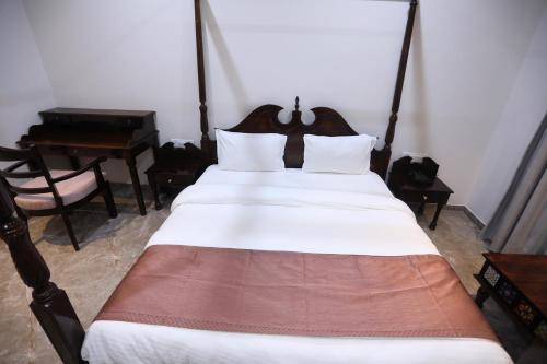 Letto o letti in una camera di Chandan Kasturi Resort