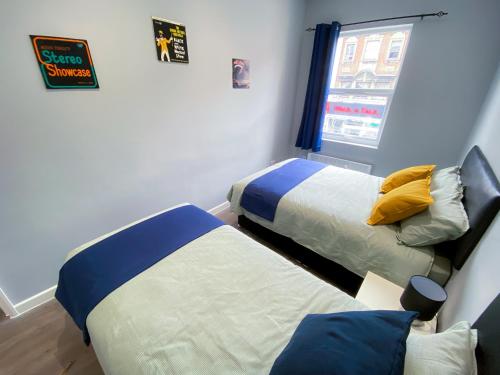 Cama o camas de una habitación en MODERN 1 BEDROOM FLAT IN WOOD GREEN