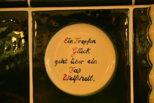 a plate with writing on it on a wall at Autenrieder Brauereigasthof in Ichenhausen