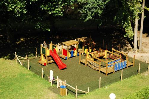 a playground with different types of play equipment at Floreal La Roche-en-Ardenne in La Roche-en-Ardenne