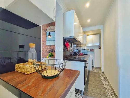 a kitchen with a counter with a bowl on it at Lydia's Place in Funchal