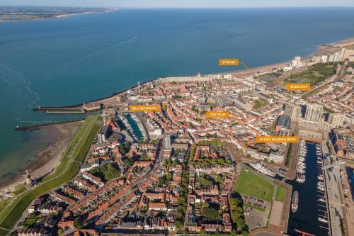 an aerial view of a city next to the water at In Den Gouden Beer in Vlissingen